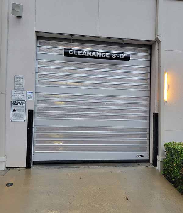 loading dock and overhead garage doors of warehouse